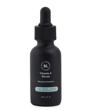 A black dropper bottle of Skin Laundry Vitamin A Serum, highlighting "1.0% RETINOL COMPLEX 1.0% ENDIMOIST® 4HA" on its label, against a white background.